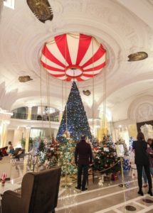 The hall of the Hôtel de Paris in Monaco will all the Christmas Trees