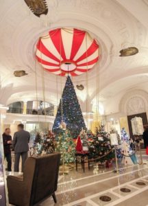 The hall of the Hôtel de Paris in Monaco will all the Christmas Trees