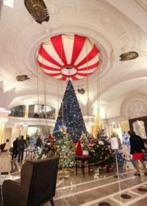 The hall of the Hôtel de Paris in Monaco will all the Christmas Trees