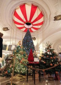 The hall of the Hôtel de Paris in Monaco will all the Christmas Trees