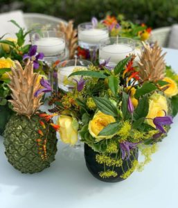 green and yellow centerpiece with pineapple