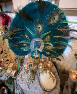 A peacock and golden decorative items