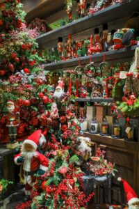 The interior of the Grimaldi boutique adorned in Christmas colors.